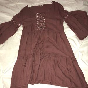 A maroon long bell sleeve midi dress